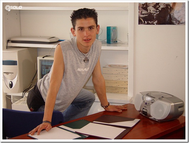 Boy beats his rod on top of table
